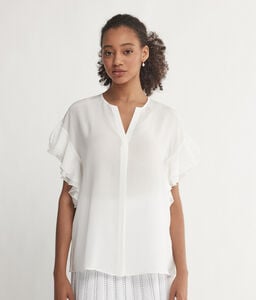 Camisa amb escot en punta de màniga curta de seda amb volants